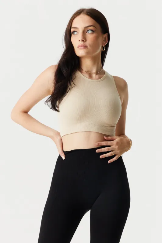 Seamless Ribbed High Neck Cropped Tank Top sold by Charlotte Russe