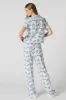 Smurfs Print Button-Up Top & Pant 2 Piece Pajama Set sold by Charlotte Russe