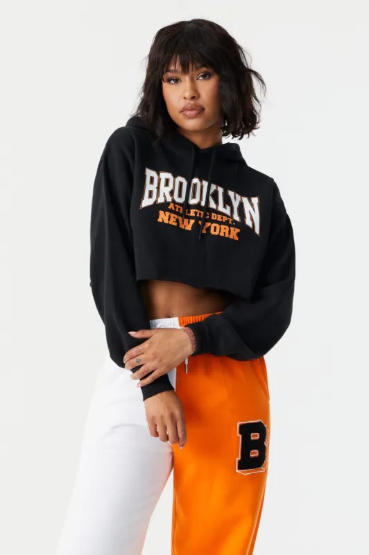 Brooklyn Graphic Cropped Fleece Hoodie sold by Charlotte Russe