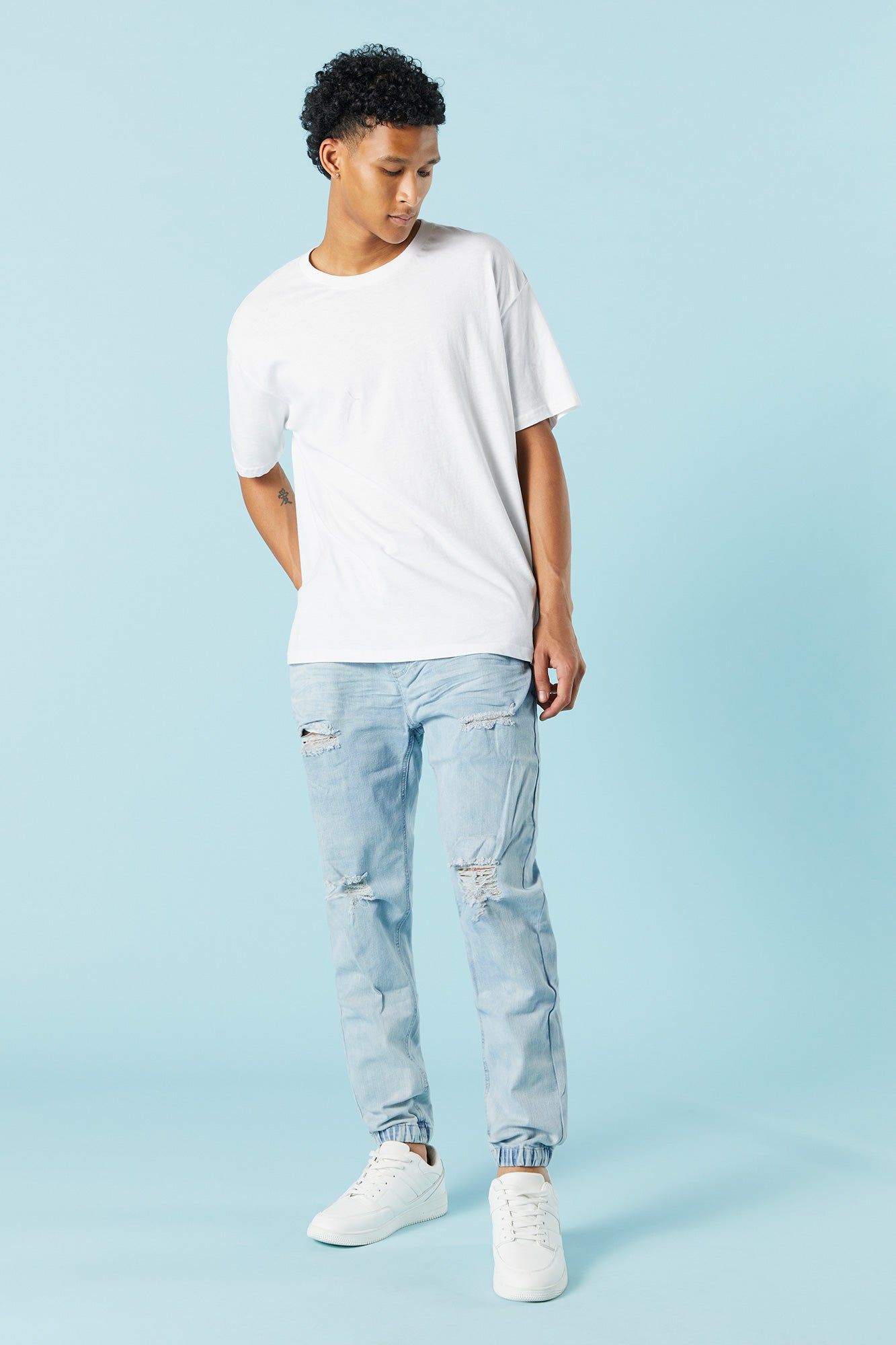 Light Wash Distressed Denim Jogger sold by Charlotte Russe product image thumbnail 2