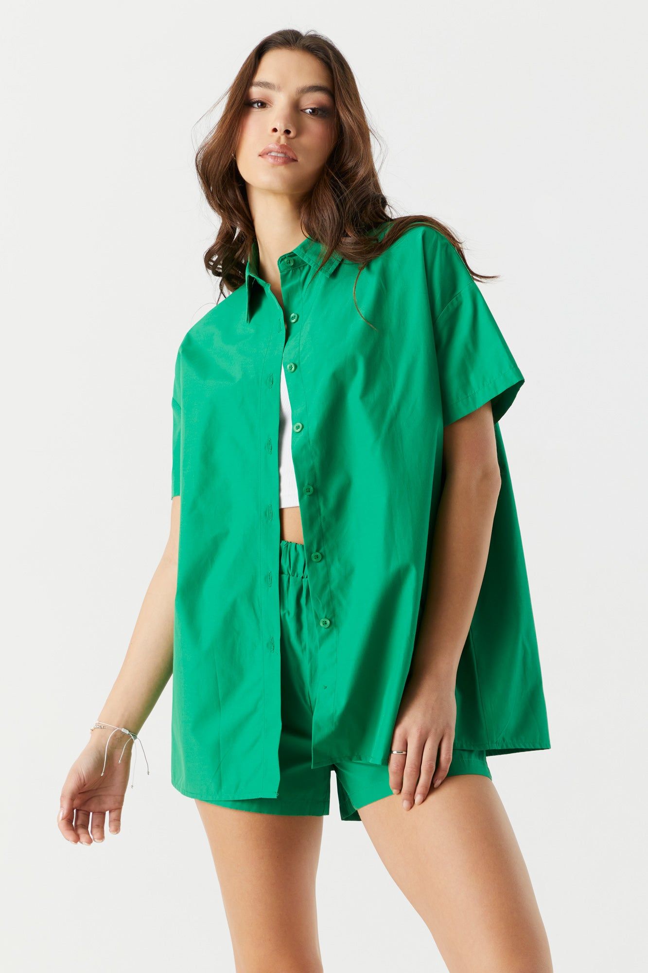 Poplin Oversized Button-Up Top sold by Charlotte Russe