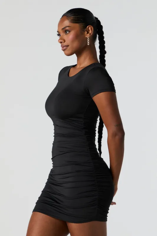 Black Contour Short Sleeve Ruched Mini Dress sold by Charlotte Russe