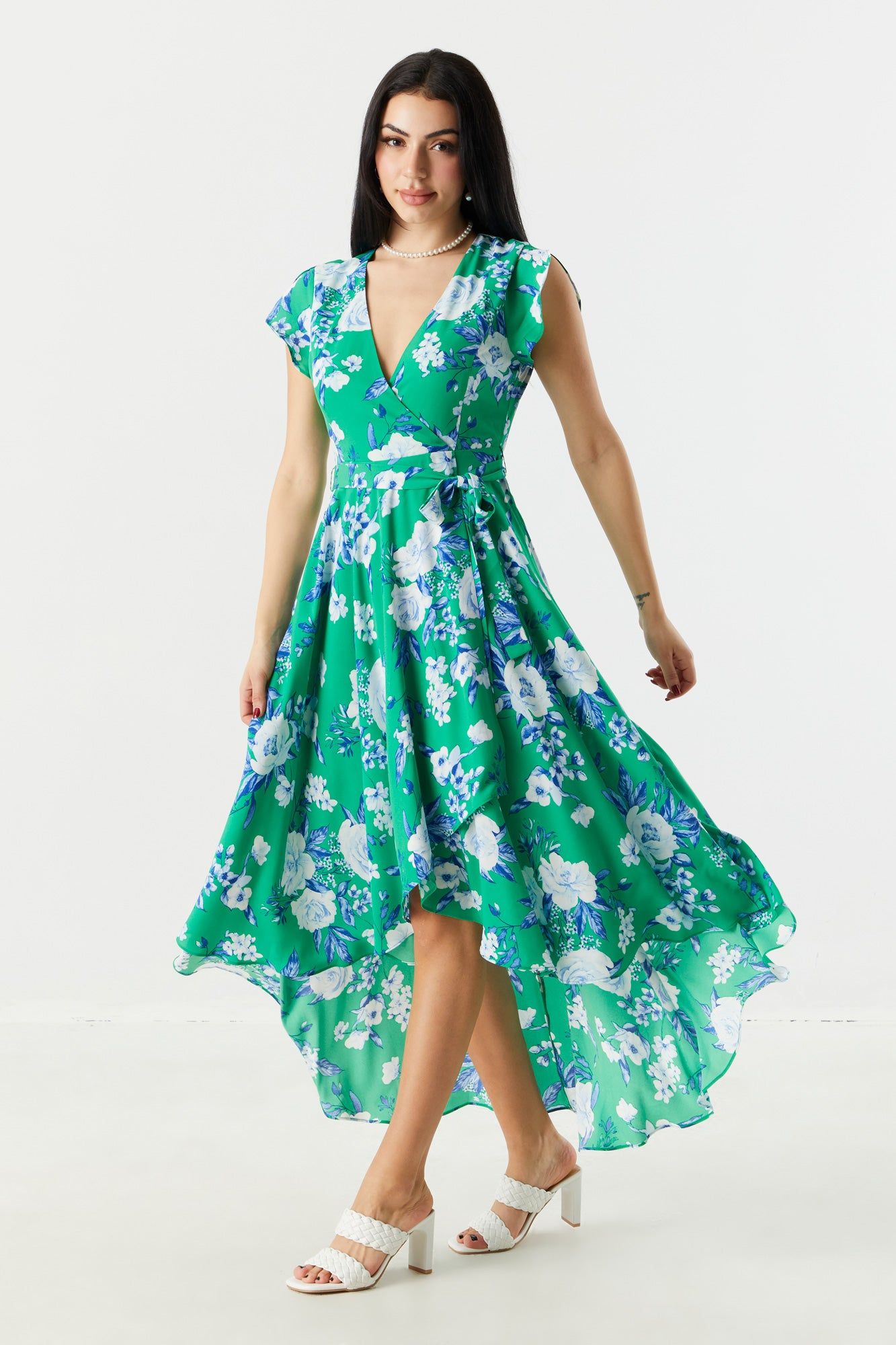 Green Floral Surplice High-Low Wrap Dress sold by Charlotte Russe