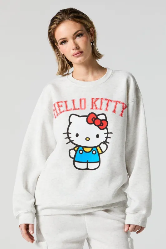 Hello Kitty Waving Graphic Fleece Sweatshirt sold by Charlotte Russe