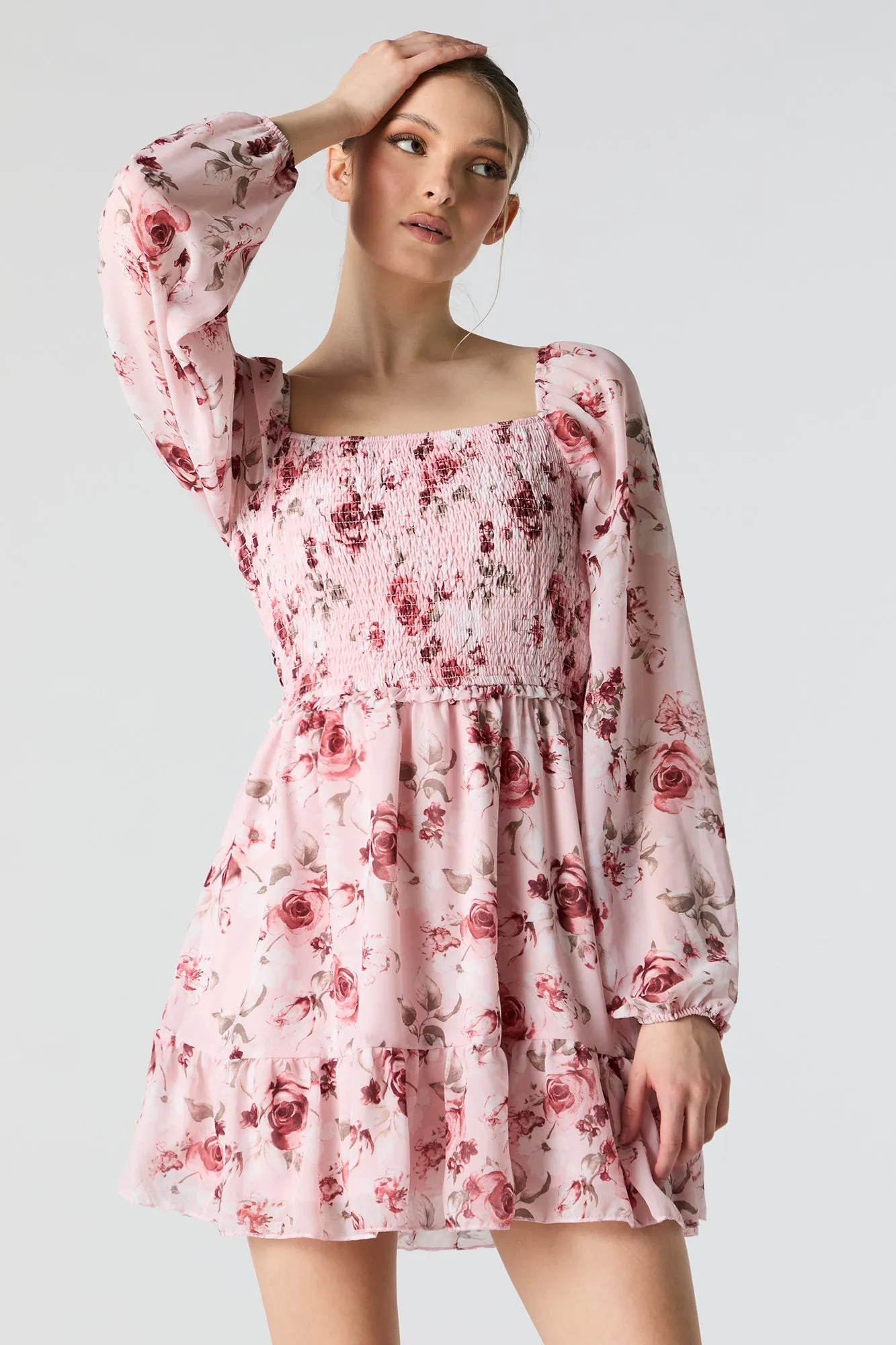 Pink Floral Smocked Long Sleeve Mini Dress sold by Charlotte Russe