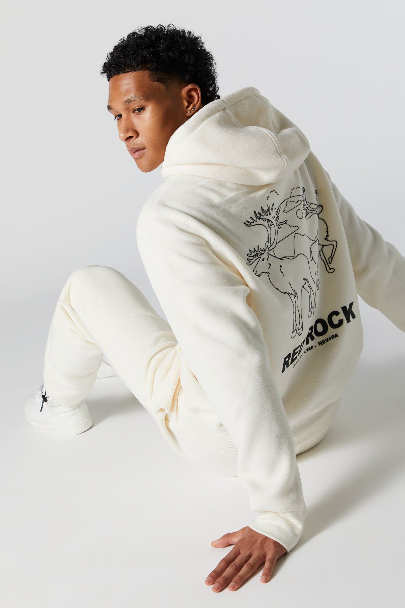 Red Rock Graphic Polar Fleece Hoodie sold by Charlotte Russe