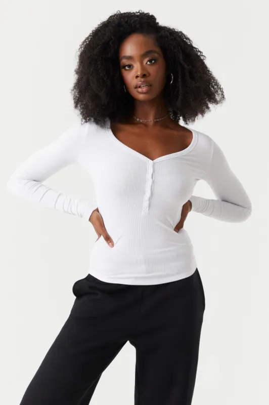 Soft Ribbed Henley Long Sleeve Top sold by Charlotte Russe