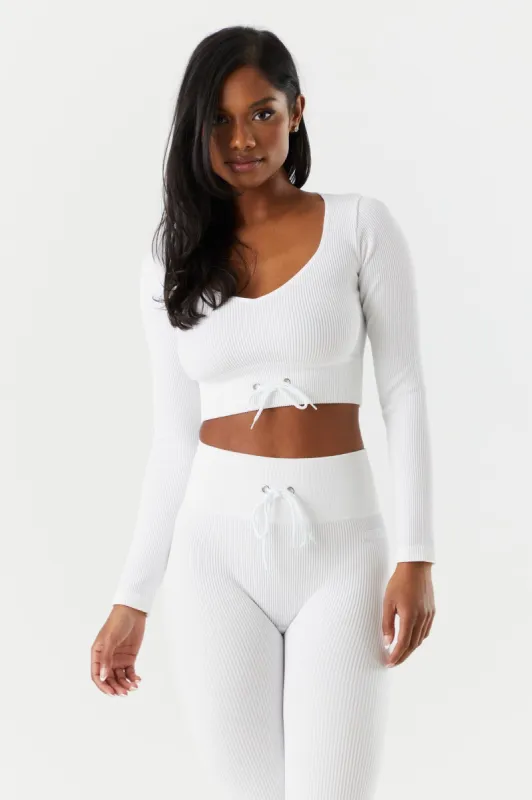 Sommer Ray Seamless Ribbed Long Sleeve Active Top sold by Charlotte Russe