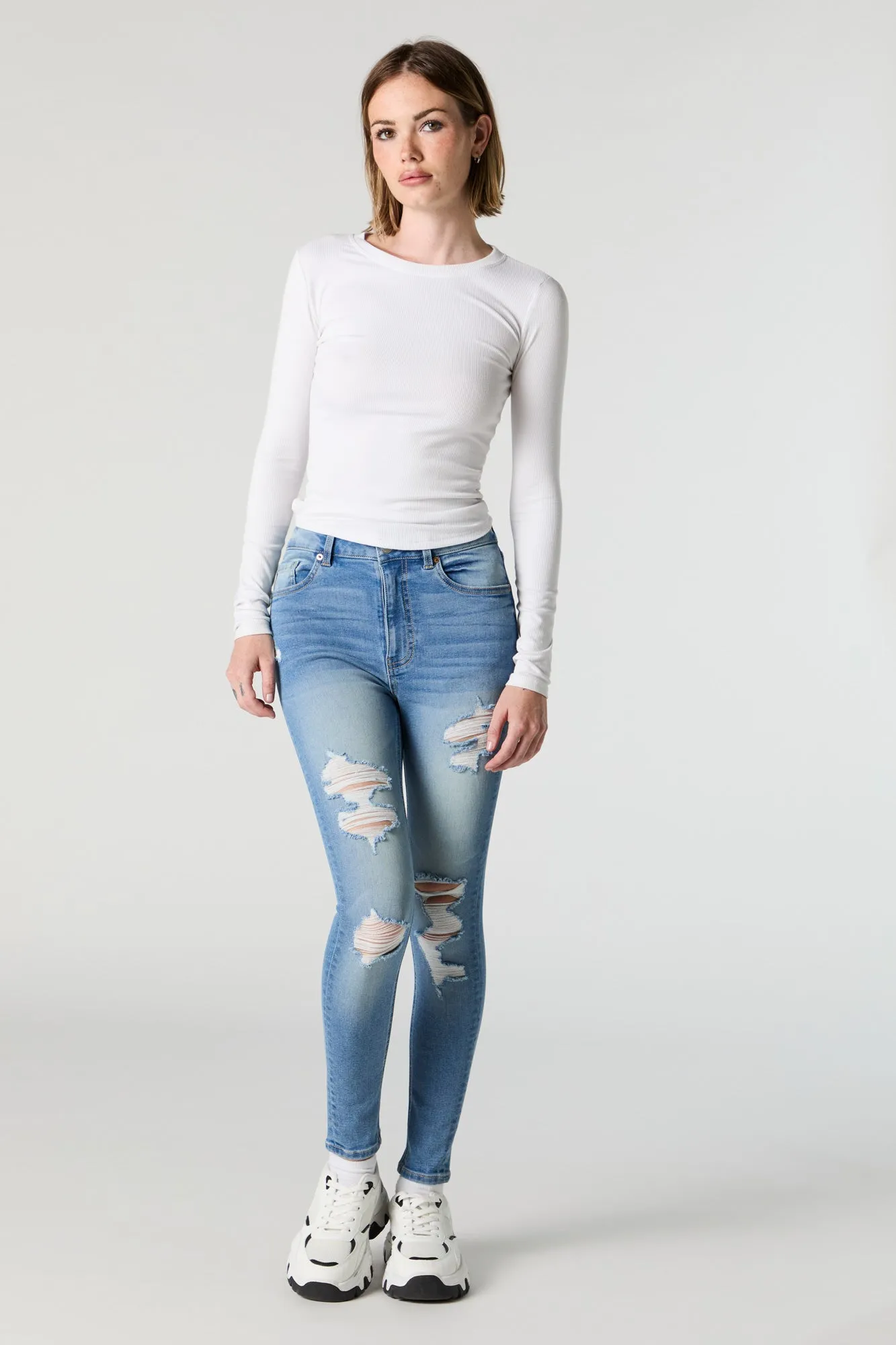 Miami Medium Wash High Rise Distressed Skinny Jean sold by Charlotte Russe
