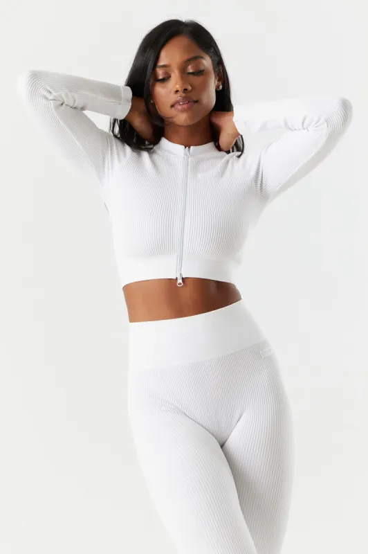 Sommer Ray Seamless Ribbed Front Zip Active Top sold by Charlotte Russe