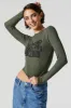 Ribbed Vintage Graphic Long Sleeve Top sold by Charlotte Russe