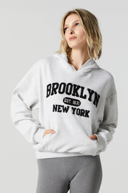 Brooklyn Chenille Embroidered Fleece Hoodie sold by Charlotte Russe