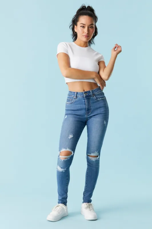 Refuge Miami Distressed Dark Wash Skinny Jean sold by Charlotte Russe