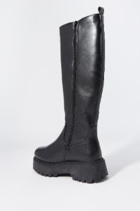 Faux Leather Platform Lug Boot sold by Charlotte Russe