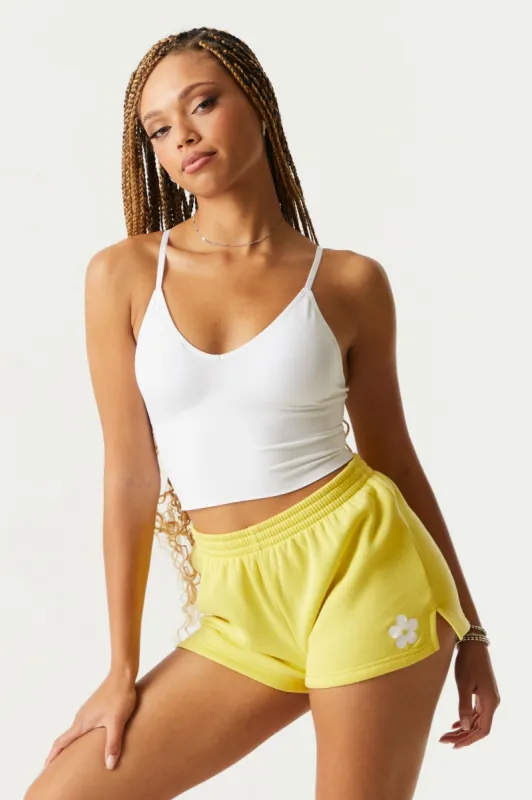 Daisy Graphic Fleece Short sold by Charlotte Russe
