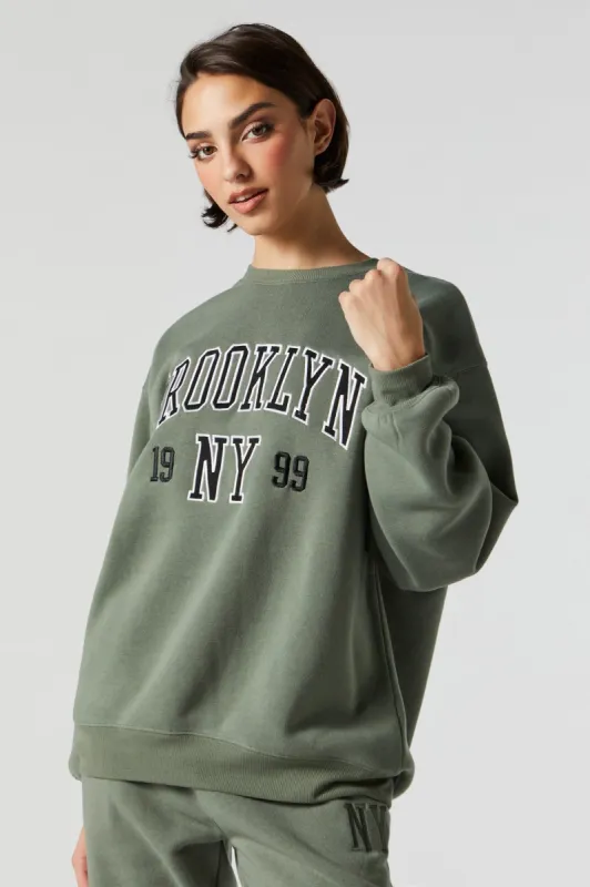 Chenille Embroidered Brooklyn Fleece Sweatshirt sold by Charlotte Russe