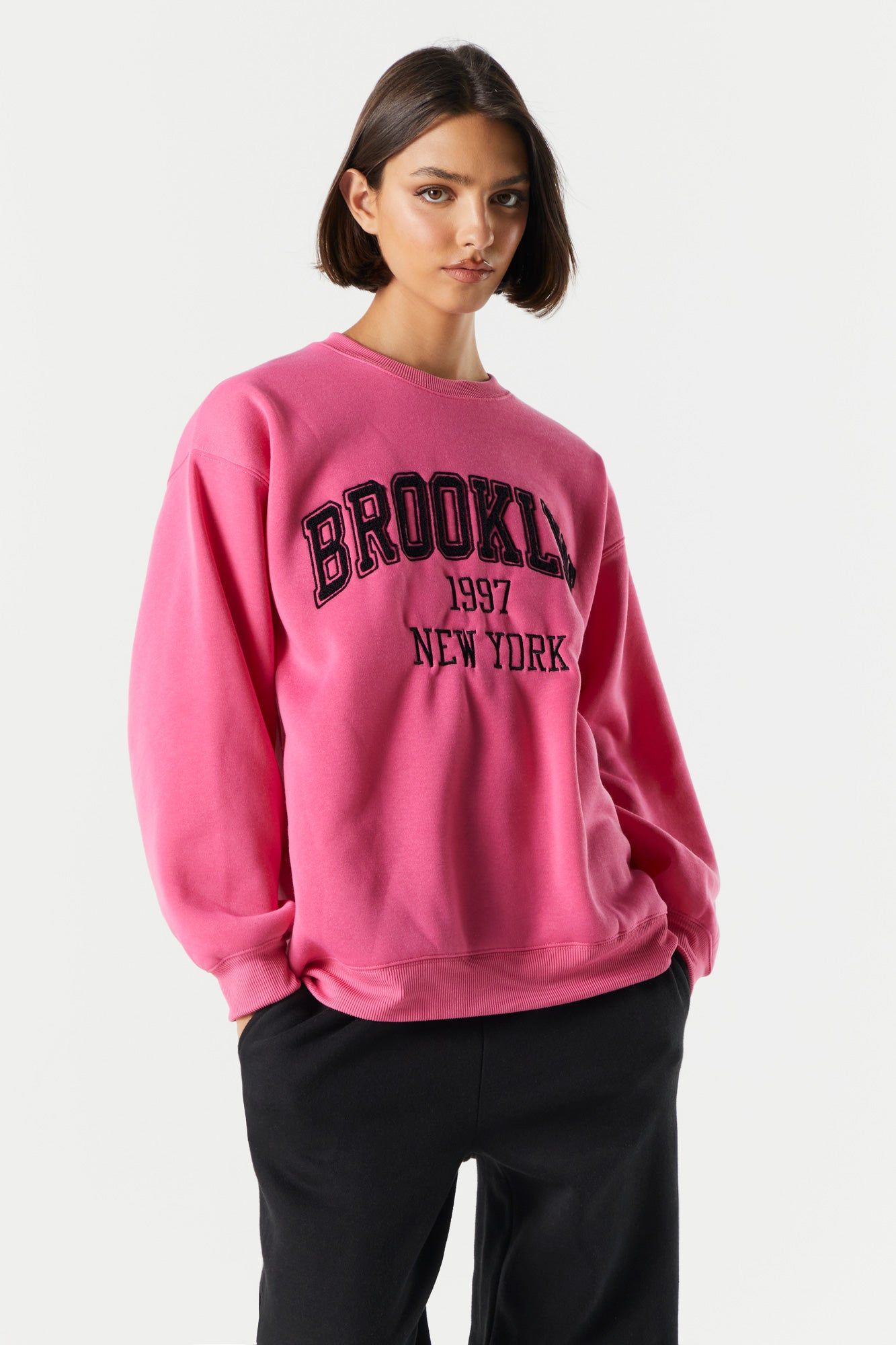 Fleece Brooklyn Graphic Sweatshirt sold by Charlotte Russe