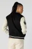 Self Made Legend Faux Suede Varsity Jacket sold by Charlotte Russe