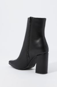 Faux-Leather Heeled Boot sold by Charlotte Russe
