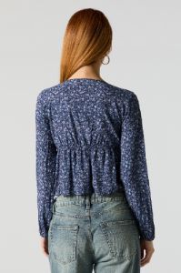 Blue Floral Long Sleeve Peplum Top sold by Charlotte Russe