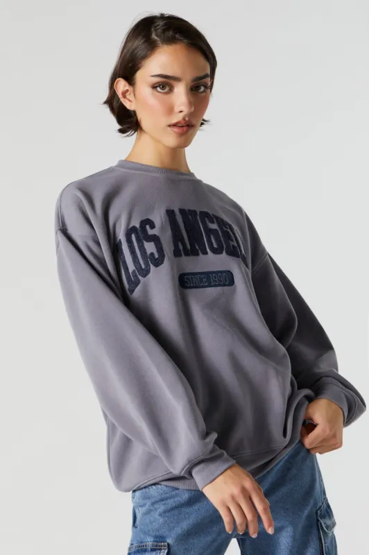Chenille Embroidered Los Angeles Fleece Sweatshirt sold by Charlotte Russe