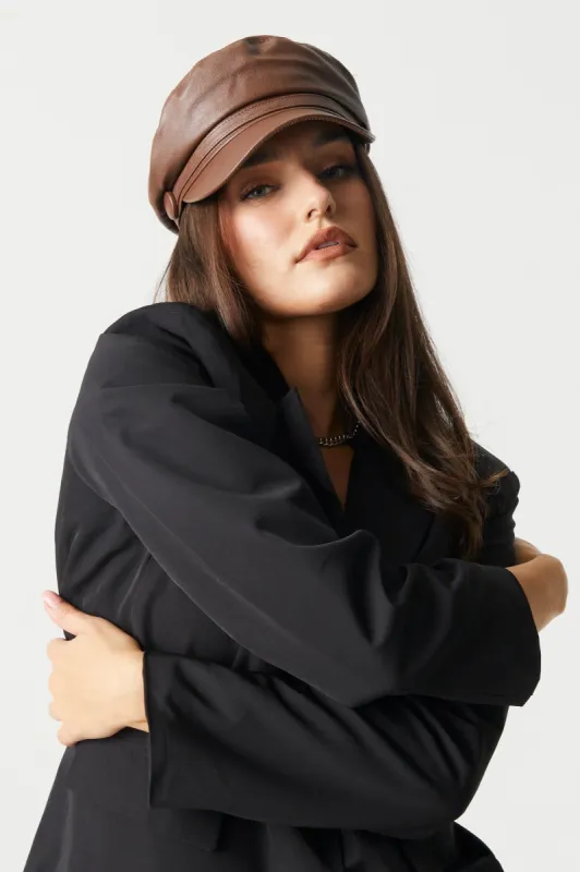 Faux-Leather Bakers Cap sold by Charlotte Russe