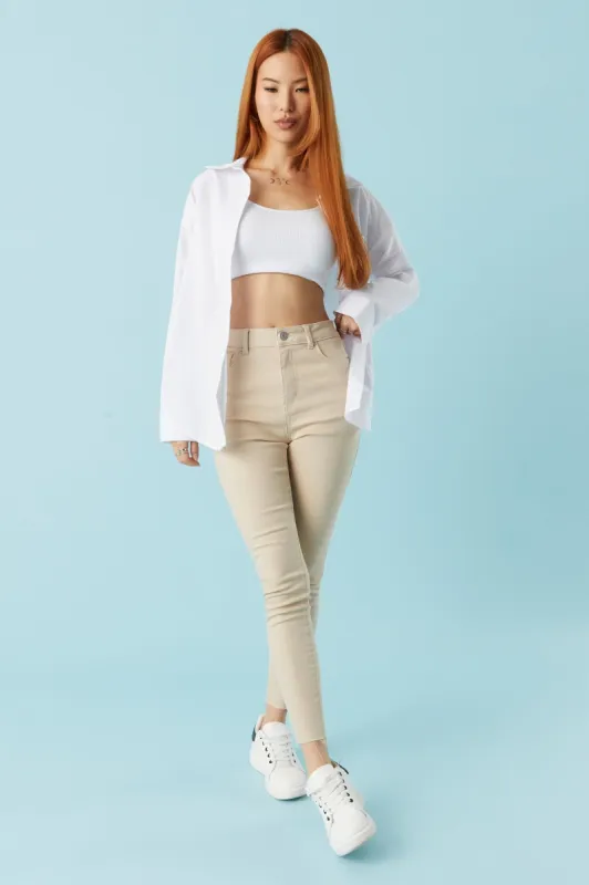 Refuge Miami Tan Wash Crop Skinny Jean sold by Charlotte Russe