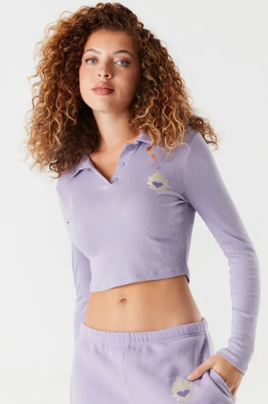 Soft Ribbed Embroidered Graphic Polo Top sold by Charlotte Russe