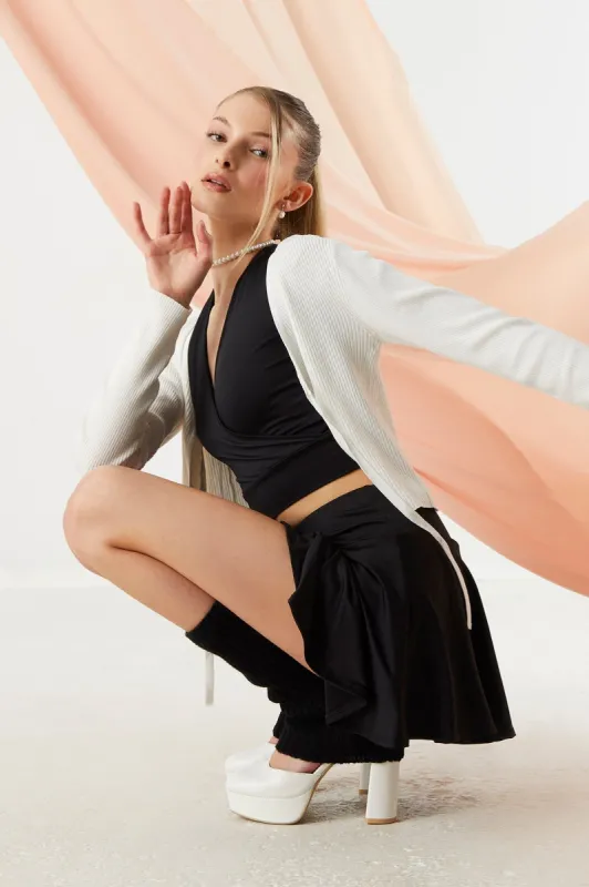 Contour Short Sleeve Wrap Top sold by Charlotte Russe