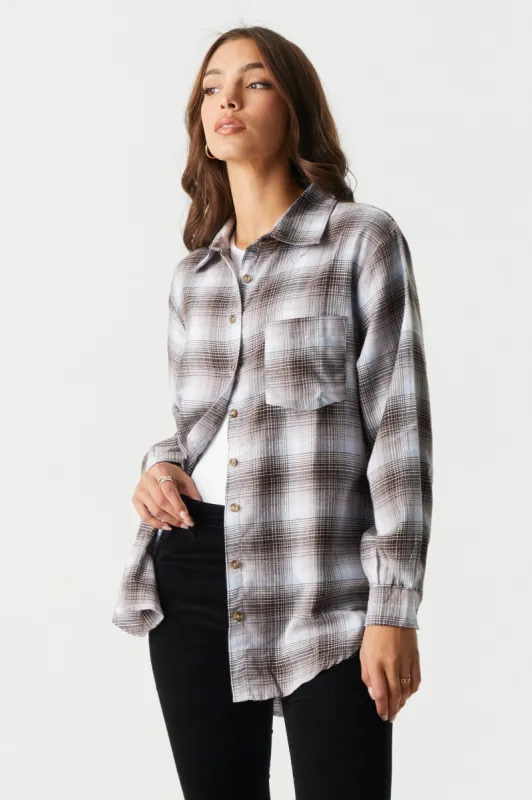 Oversized Blue Plaid Flannel Shirt sold by Charlotte Russe