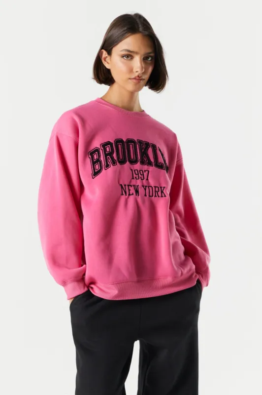 Fleece Brooklyn Graphic Sweatshirt sold by Charlotte Russe