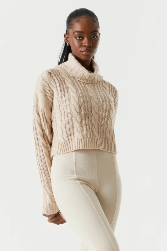Cable Knit Cropped Turtleneck Sweater sold by Charlotte Russe