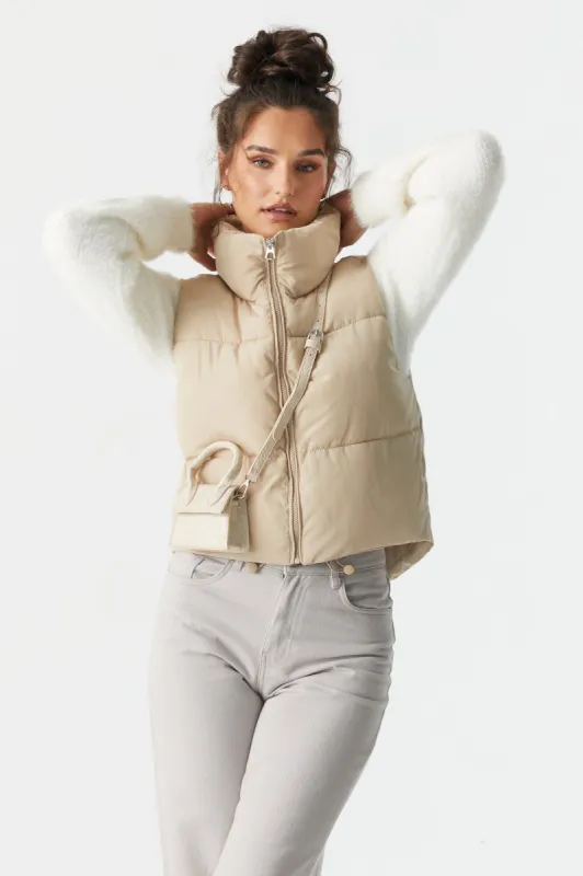 Zip-Up Crop Puffer Vest sold by Charlotte Russe