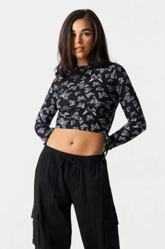 Butterfly Print Cinched Long Sleeve Crop Top sold by Charlotte Russe