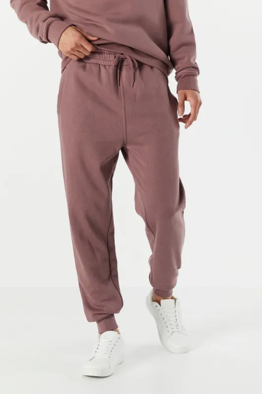 Coloured Solid Fleece Jogger sold by Charlotte Russe