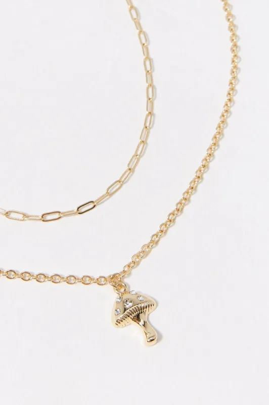 14k Gold Plated Rhinestone Mushroom Charm Necklace Set (2 Pack) sold by Charlotte Russe