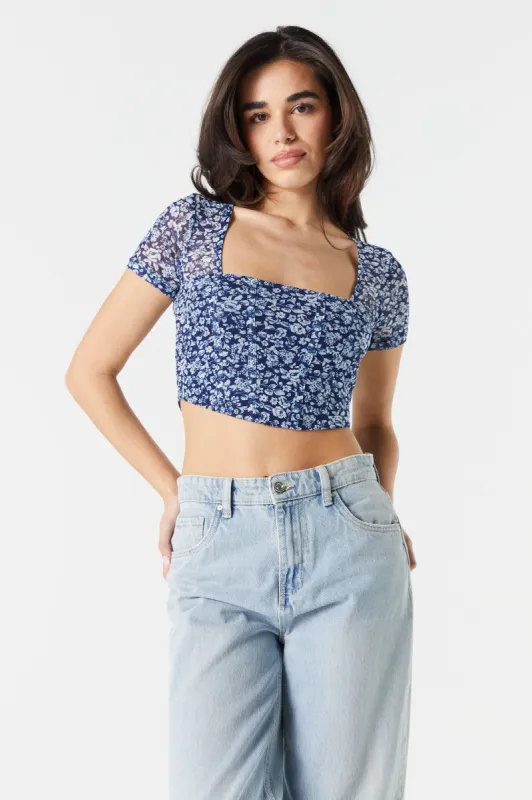 Blue Floral Mesh Sleeve Corset Top sold by Charlotte Russe