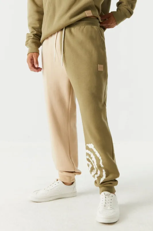 Spliced World Wide Graphic Jogger sold by Charlotte Russe