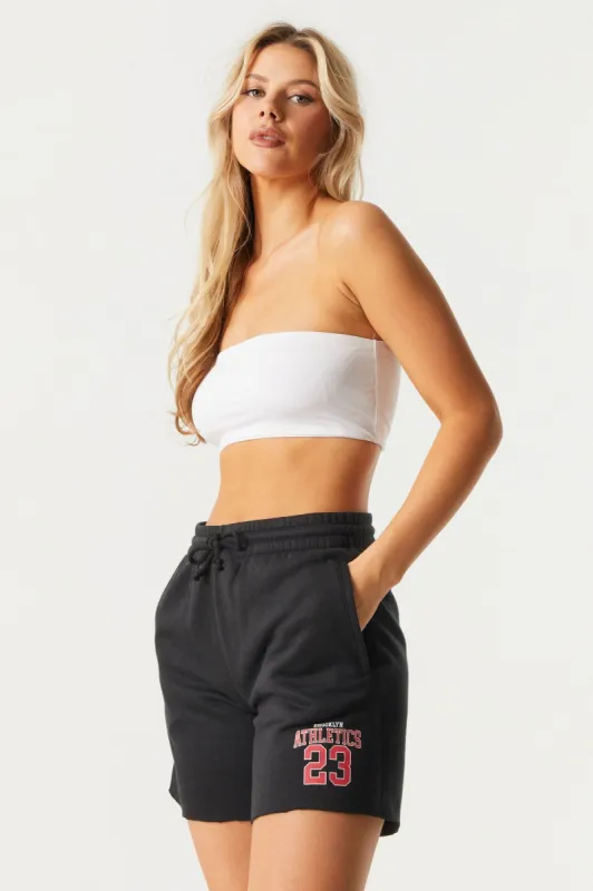Athletics Graphic Fleece Basketball Short sold by Charlotte Russe