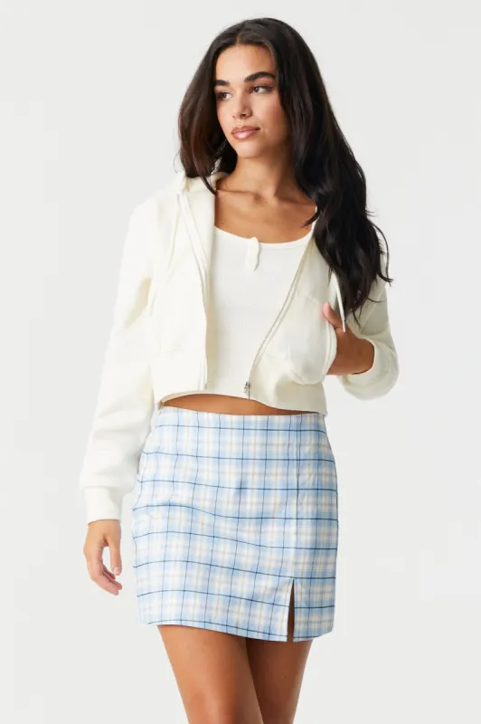 High-Rise Blue Plaid Leg Slit Mini Skirt sold by Charlotte Russe