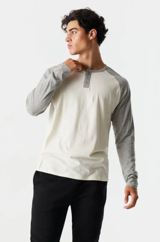 Long Sleeve Raglan Henley Top sold by Charlotte Russe