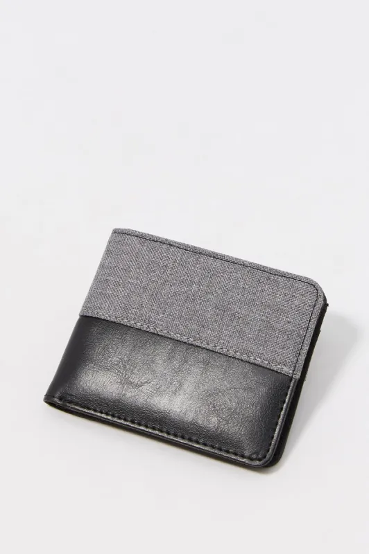 Two-Toned Faux-Leather Wallet sold by Charlotte Russe