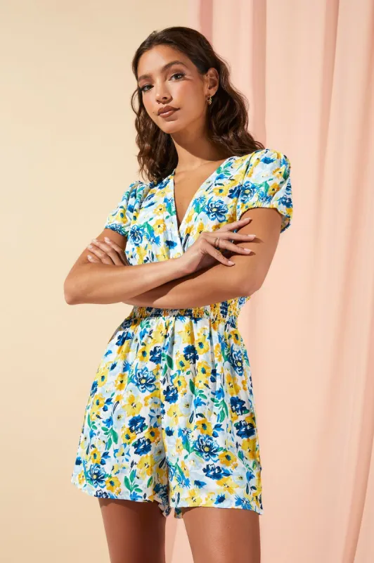 Blue and Yellow Floral Surplice Smocked Romper sold by Charlotte Russe