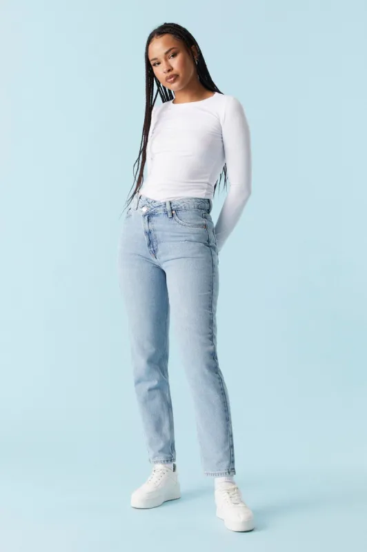 Refuge Criss Cross Light Wash Mom Jean sold by Charlotte Russe