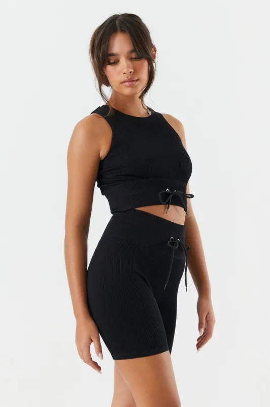Refuge Seamless Ribbed Tie Biker Shorts sold by Charlotte Russe