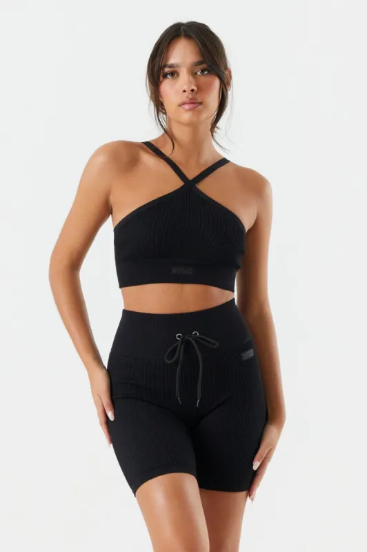 Refuge Seamless Ribbed Cross Neck Bra sold by Charlotte Russe