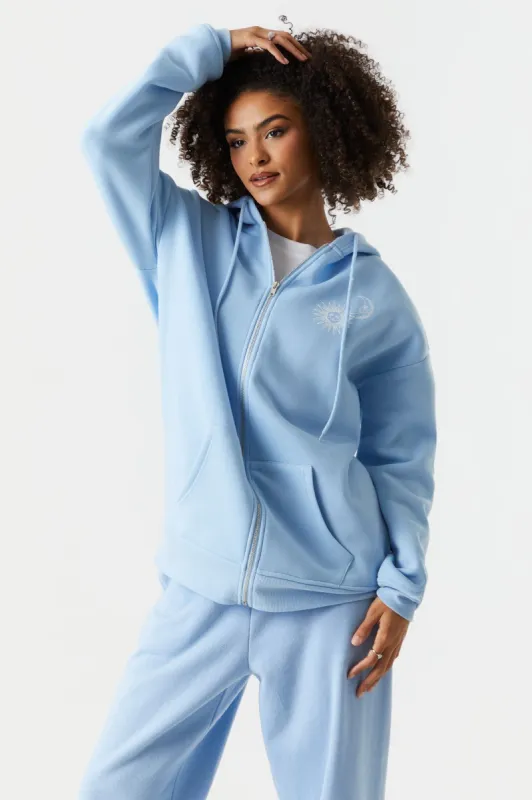Mystic Sun And Moon Graphic Oversized Fleece Zip Hoodie sold by Charlotte Russe