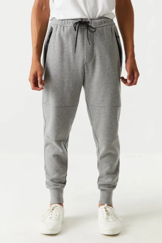 Solid Rubber Zip Pocket Jogger sold by Charlotte Russe