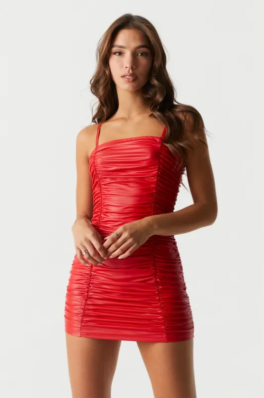 Faux-Leather Bodycon Ruched Mini Dress sold by Charlotte Russe