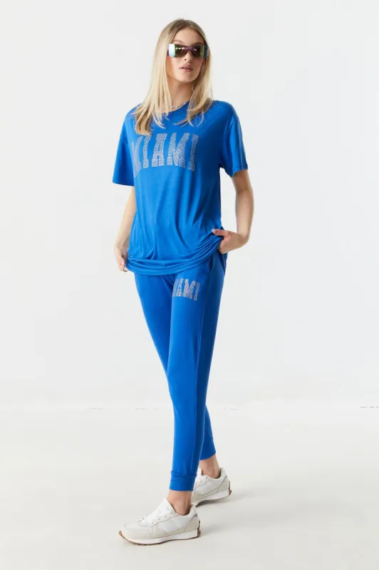 Soft Miami Rhinestone Decal Fleece Jogger sold by Charlotte Russe